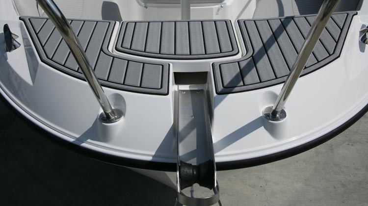 Anchor roller and concealed recess for optional windlass